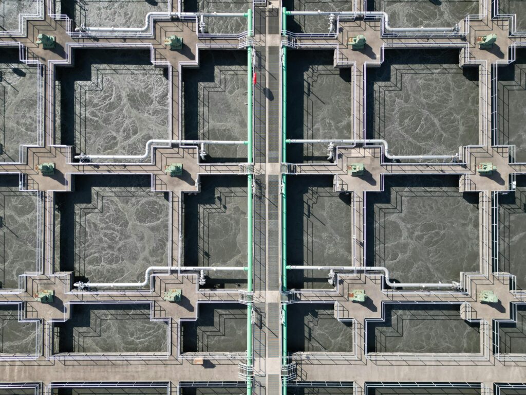 Aerial shot of a water treatment plant showing complex industrial design.